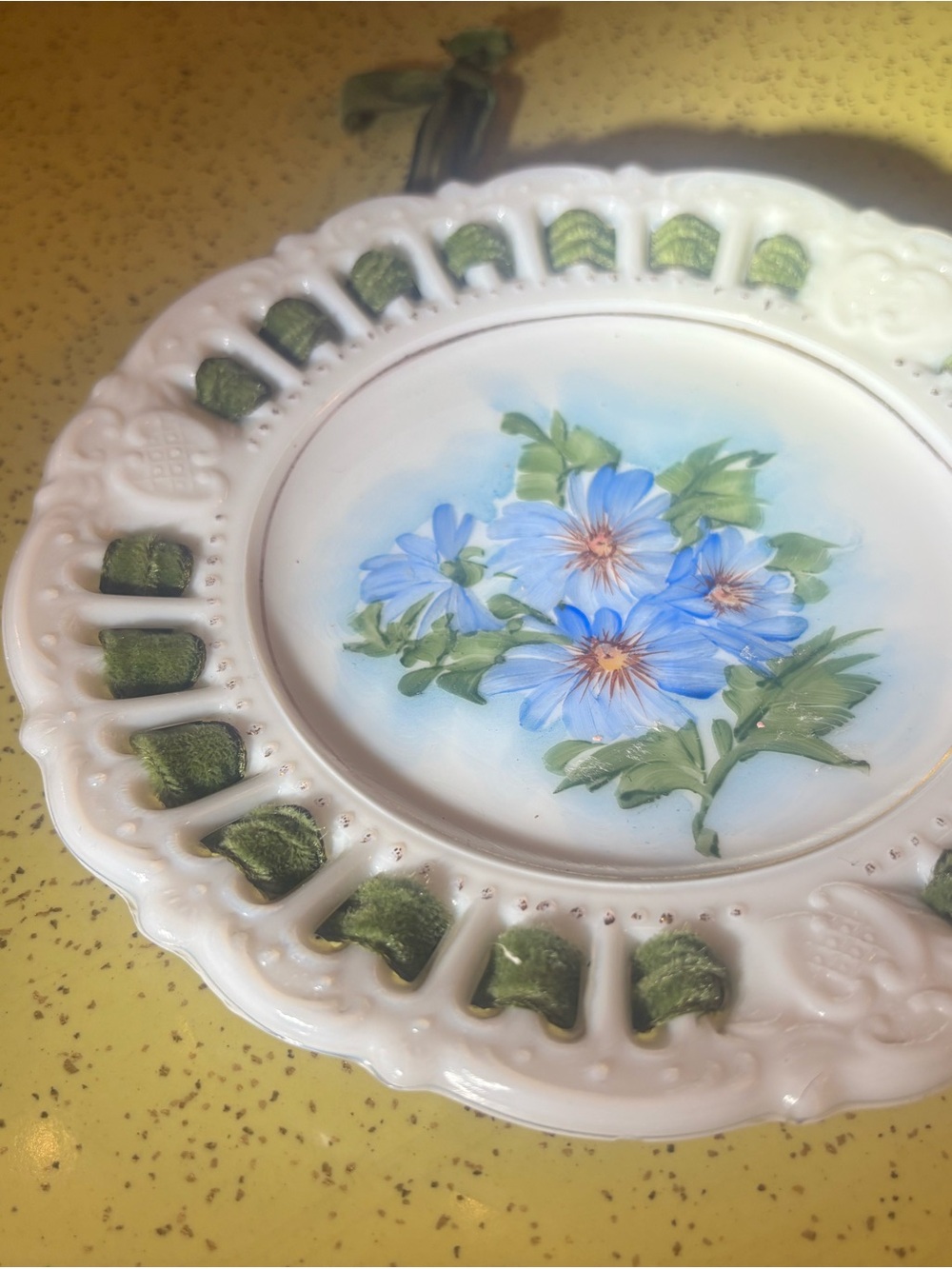 2 VINTAGE MILK-GLASS HAND PAINTED FLORAL MOTIF WITH RIBBON DECORATIVE PLATES.
